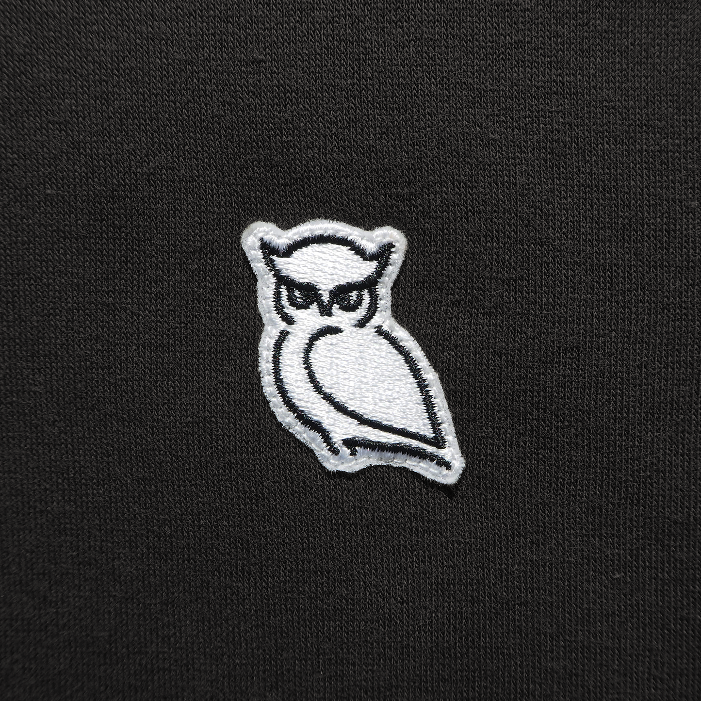 owl logo fleece fabric black
